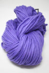 Cascade Yarns Magnum bulky yarn in vibrant ultraviolet color, showcasing thick, soft yarn ideal for cozy knitting projects.