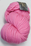 Cascade Yarns Magnum bulky yarn in cotton candy pink, showcasing a soft, textured skein ideal for knitting or crochet projects.