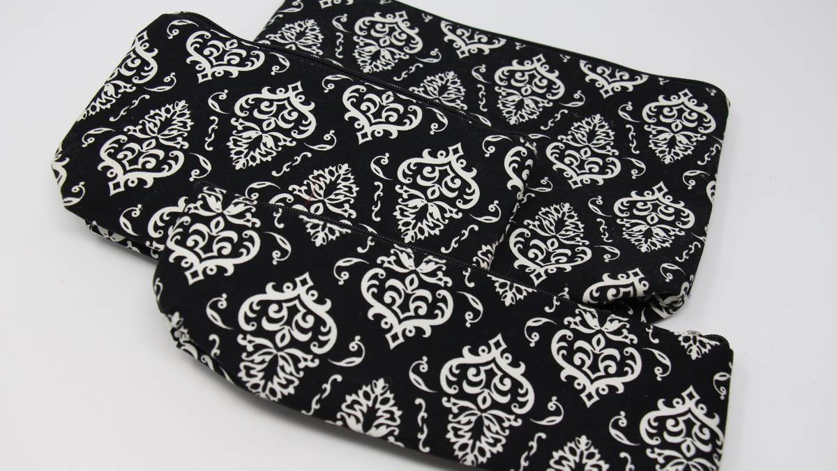 Della Q | Zip Pouches