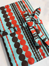 Della Q double point knitting needle rollup case with multiple compartments, shown open with knitting needles inside.