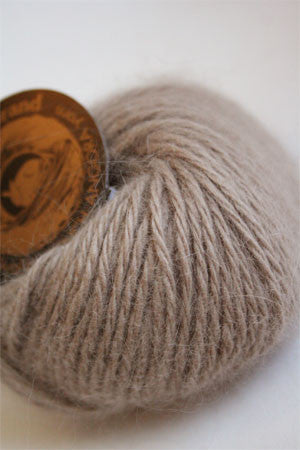 Galler Yarn Belangor French Angora yarn ball showing soft, plush Angora fiber in natural cream color.