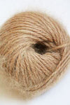 Soft Belangor French Angora yarn by Galler Yarn, showing spun pinkish-white angora fibers in a close-up view.