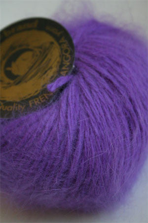 Cream-colored Belangor French Angora yarn by Galler Yarn, showcasing soft, fluffy angora fibers on a neutral background.