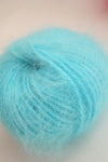 Turquoise Belangor French Angora yarn by Galler Yarn, soft and fluffy angora fiber for knitting and crafting.