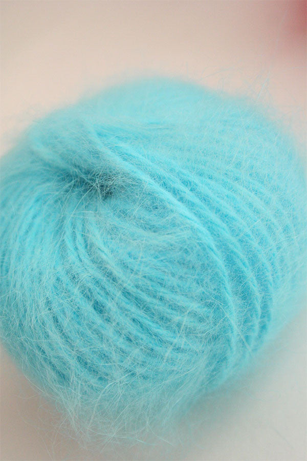 Turquoise Belangor French Angora yarn by Galler Yarn, soft and fluffy angora fiber for knitting and crafting.