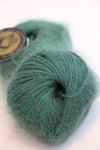 Galler Yarn Belangor French Angora yarn ball in soft cream color, showcasing its fluffy, luxurious angora fibers.