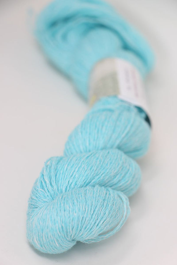 Jade Sapphire Sylph linen and cashmere yarn skein in natural tones, showcasing soft, luxurious fiber blend for knitting or crafting.