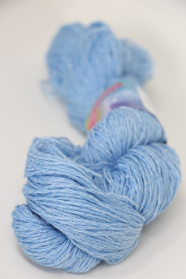 Jade Sapphire Sylph linen and cashmere yarn in cerulean blue, showcasing soft, luxurious fibers ideal for knitting or weaving.