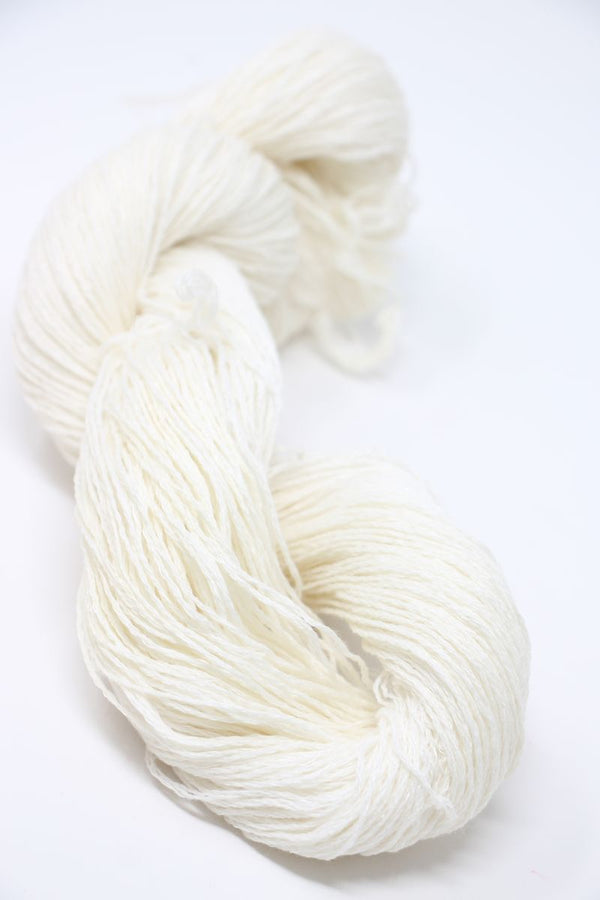 Jade Sapphire Sylph linen and cashmere yarn in a soft, fluffy puff ball, showcasing luxurious natural fibers and texture.