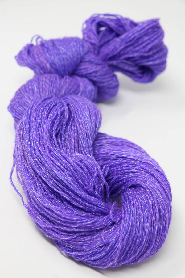 Jade Sapphire Sylph Victorian Violet linen and cashmere yarn spool showcasing soft purple fiber for knitting or weaving projects.