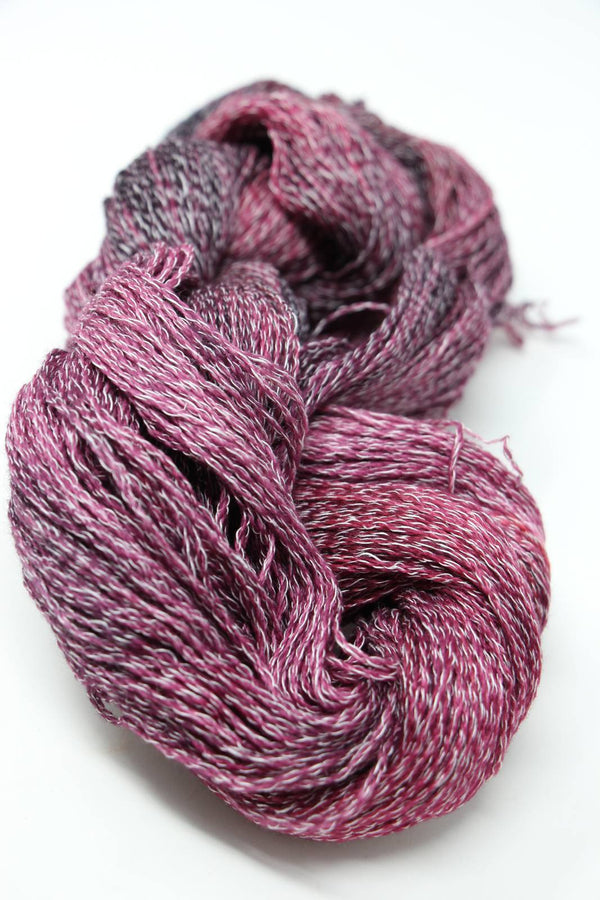 Pink Sylph Linen and Cashmere Yarn by Jade Sapphire Cashmere, showing soft, textured fibers suitable for knitting or weaving.