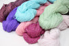 Jade Sapphire Sylph Linen & Cashmere Yarn in a group shot, showcasing soft, luxurious cashmere and linen blend fibers.
