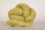 Close-up of Jade Sapphire Sylph linen and cashmere yarn in maidenhair color, showcasing soft, lightweight fibers for knitting or weaving.