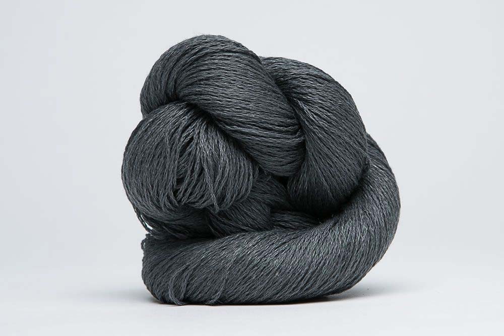 Close-up of Jade Sapphire Sylph linen and cashmere yarn showcasing soft, textured fibers ideal for knitting and weaving projects.