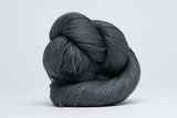 Close-up of Jade Sapphire Sylph linen and cashmere yarn showcasing soft, textured fibers ideal for knitting and weaving projects.