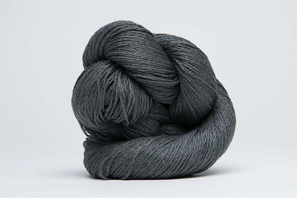 Close-up of Jade Sapphire Sylph linen and cashmere yarn showcasing soft, textured fibers ideal for knitting and weaving projects.