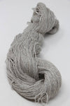 Jade Sapphire Sylph linen and cashmere yarn in rust color, showcasing soft, textured fibers for knitting or crochet projects.