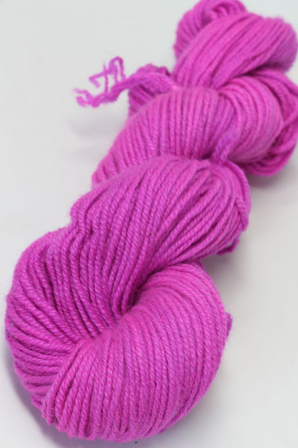 Jade Sapphire Zageo 6 Ply Cashmere yarn in periwinkle pink, showing soft, luxurious wool fibers and vibrant color.