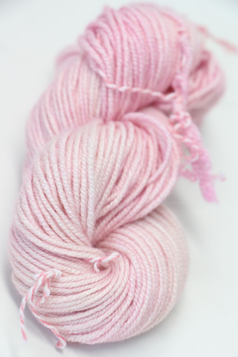Pink Jade Sapphire Zageo 6 Ply Cashmere Yarn, soft and luxurious fiber for knitting or crochet projects.