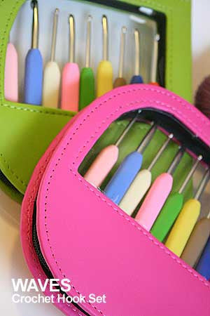 KnitPro Knitters Pride Waves crochet hook set with colorful ergonomic knitting needles and hooks arranged in a case.