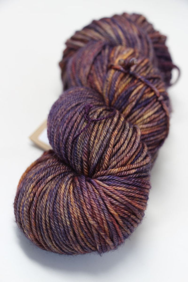 Madelinetosh Tosh DK yarn in Firewood color, soft and variegated wool yarn for knitting or crochet projects.
