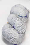 Madelinetosh Tosh DK yarn in Silver Fox color, showing a close-up of soft, hand-dyed wool yarn with subtle gray tones.