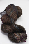 Madelinetosh Tosh DK yarn in Whiskey Barrel color, soft wool blend shown in close-up, ideal for knitting and crochet projects.