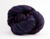 Madelinetosh Tosh DK yarn in Raspberry Cordial, soft and vibrant hand-dyed wool skein for knitting and crochet projects.