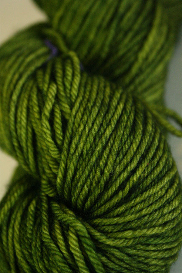 Madelinetosh Tosh DK yarn in Jade color, soft wool yarn for knitting and crocheting projects.