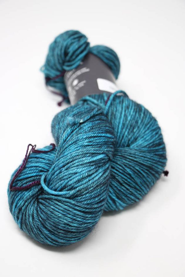 Madelinetosh Tosh DK yarn in Esoteric colorway, soft twisted wool yarn for knitting and crocheting projects.