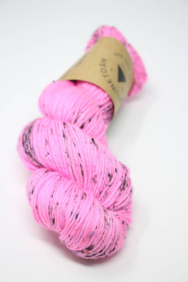 Madelinetosh Tosh DK yarn in Beach Bonfire color, soft and vibrant wool-dk weight for knitting or crocheting projects.