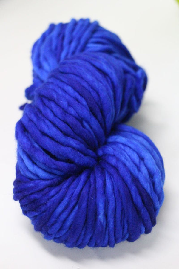 Malabrigo Rasta merino wool yarn in Matisse Blue, showing thick, soft, hand-dyed yarn with vibrant blue and purple tones.