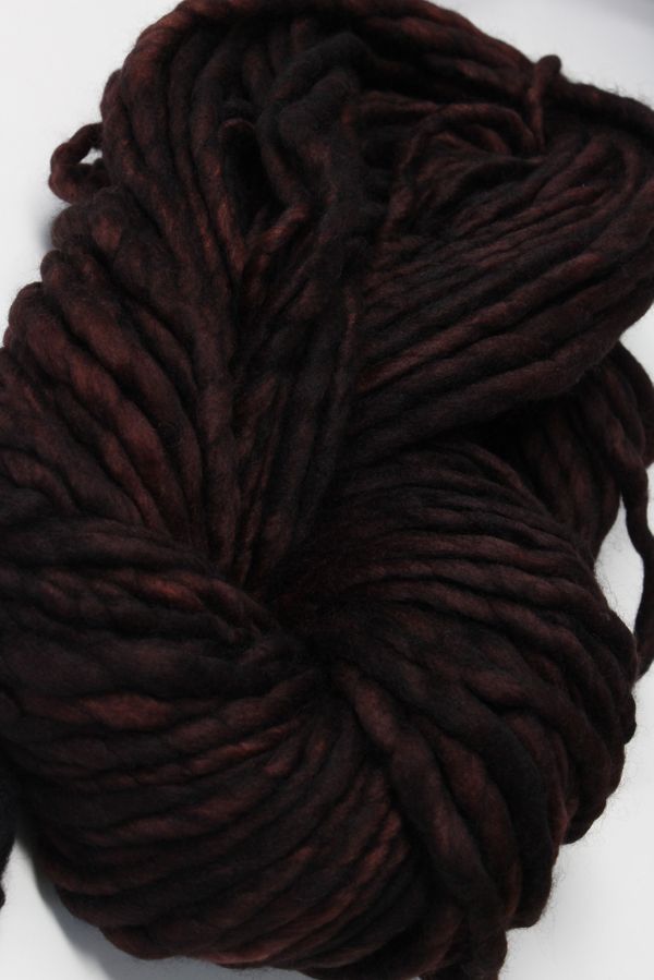 Malabrigo Rasta merino wool yarn in blegianchocolate color, showcasing thick, soft textured yarn for knitting or crochet projects.