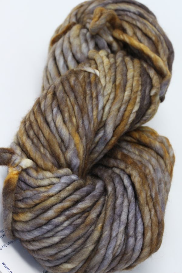 Malabrigo Rasta merino wool yarn in dark black color, showcasing thick, soft, hand-dyed yarn with a textured appearance.