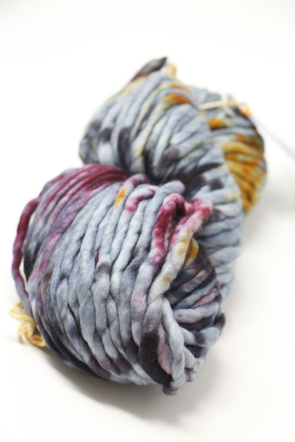 Malabrigo Rasta Merino Wool Yarn in Tundra color, showcasing thick, vibrant, hand-knit style yarn for knitting or crochet projects.