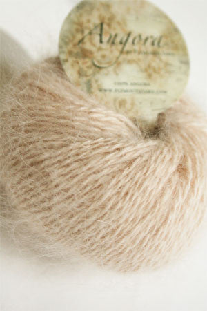 Plymouth Angora Yarn in sand color, showing soft, fluffy knitting yarn with a close-up of the textured fibers and gentle color.