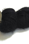 Black Plymouth Angora Yarn displayed in a close-up image showing soft, fluffy texture of the knitting yarn.