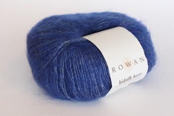 Soft, multicolored Rowan Kidsilk Haze yarn ball showing its fine, lightweight texture and vibrant color blend.