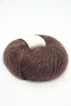 Soft Rowan Kidsilk Haze yarn in bark color, showcasing delicate, lightweight fiber ideal for knitting and crochet projects.