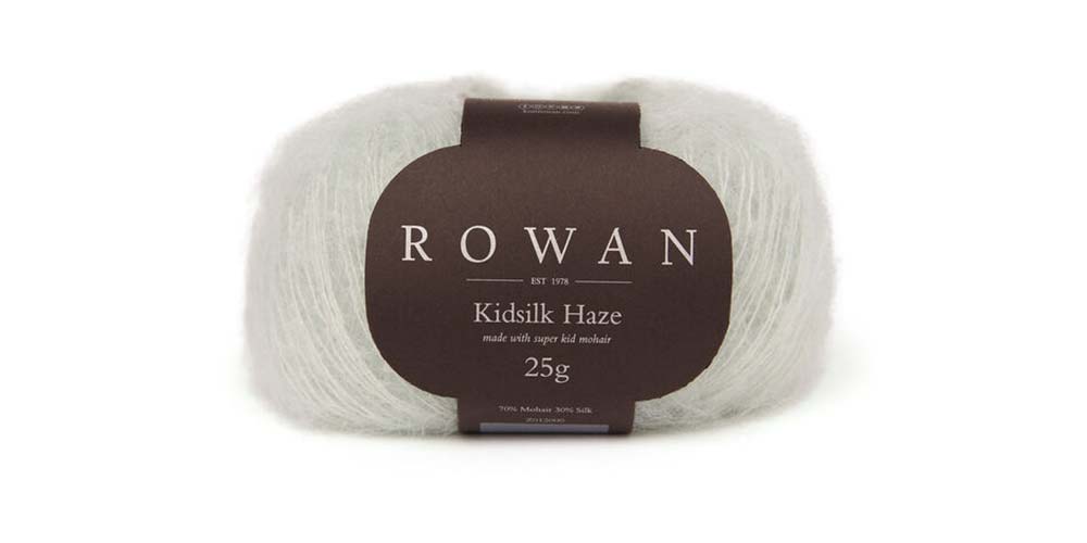 Rowan Kidsilk Haze yarn in mint green, soft and delicate, ideal for knitting or crochet projects.