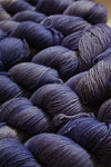 Fingering weight yarn by Zen Yarn Garden in a soft periwinkle color, showcasing the Serenity 20 collection.