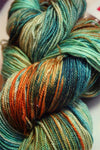 Zen Yarn Garden Serenity 20 fingering weight yarn in glitter Tiffany color, showcasing vibrant blue with subtle shimmer.