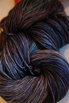Close-up of Zen Yarn Garden Serenity 20 fingering weight yarn in soft, variegated shades with a smooth, silky texture.