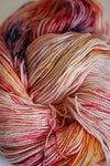 Close-up of Zen Yarn Garden Serenity 20 fingering weight yarn in soft, variegated colors, showcasing its smooth texture and vibrant hues.