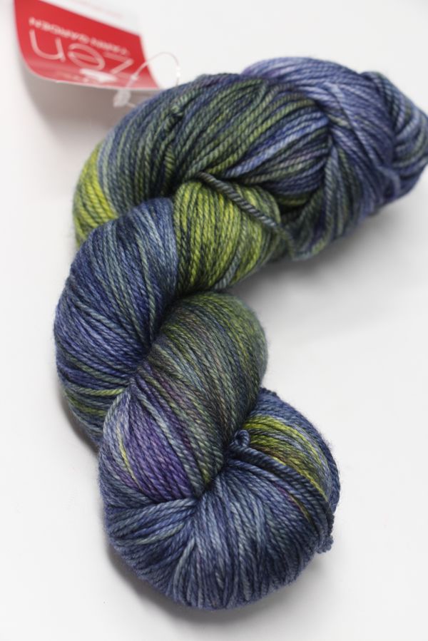 Blue and green fingering weight yarn from Zen Yarn Garden's Serenity 20 collection, showcasing soft, variegated yarn for knitting or crochet