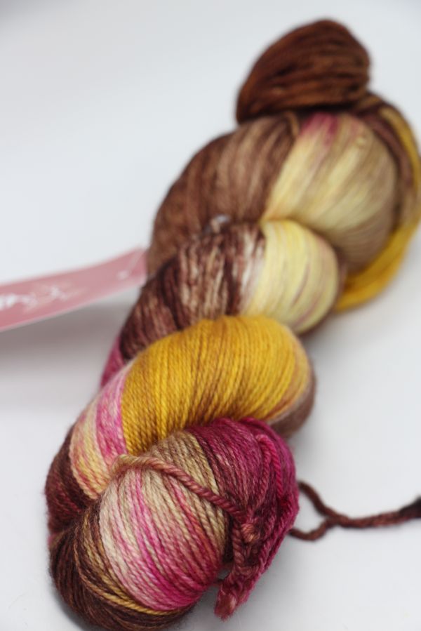 Fingering weight yarn from Zen Yarn Garden's Serenity 20 collection in vibrant color with soft, smooth texture and subtle color variations.