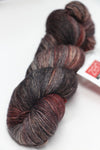 Fingering weight Serenity 20 yarn by Zen Yarn Garden in rich mahogany color, showcasing soft, high-quality fiber and vibrant hue.