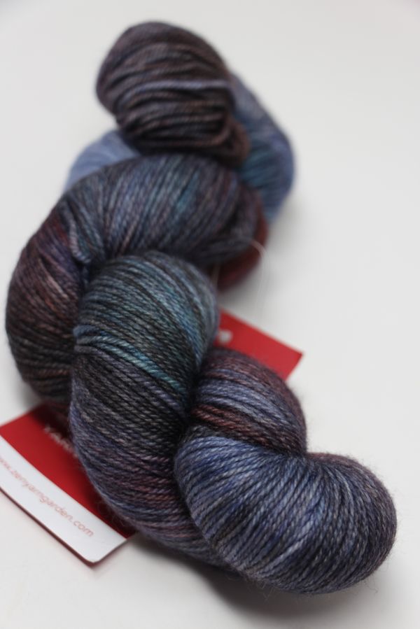 Fingering weight yarn from Zen Yarn Garden's Serenity 20 collection, featuring a soft, twilight-inspired colorway.