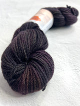 Black Jade Sapphire 8 ply cashmere yarn spool, soft and luxurious cashmere fiber for knitting or crafting.