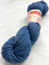 Blue and purple skein of Jade Sapphire 8 Ply Cashmere Yarn by Jade Sapphire Cashmere, showcasing soft, luxurious cashmere fibers.